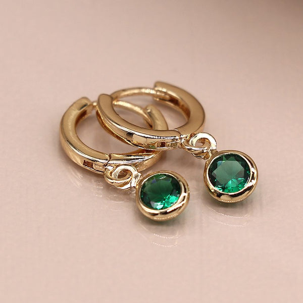 Golden mini hoop earrings with green crystal drops