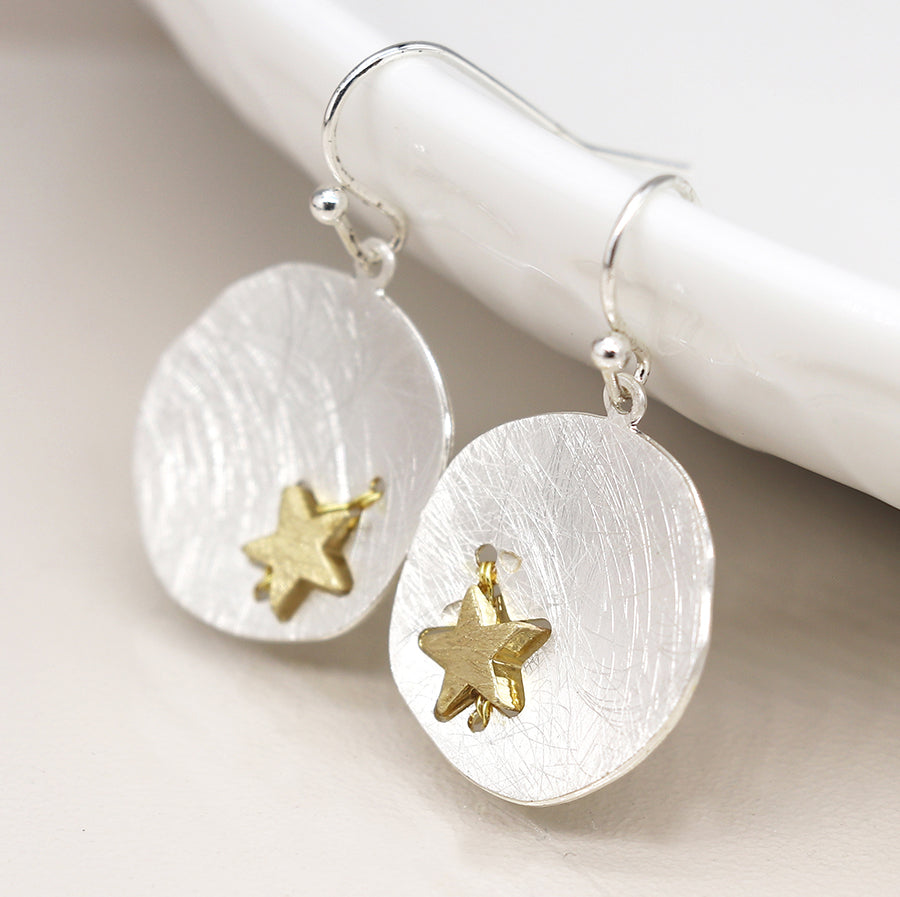 Silver plated scratched finish concave disc earrings with golden star