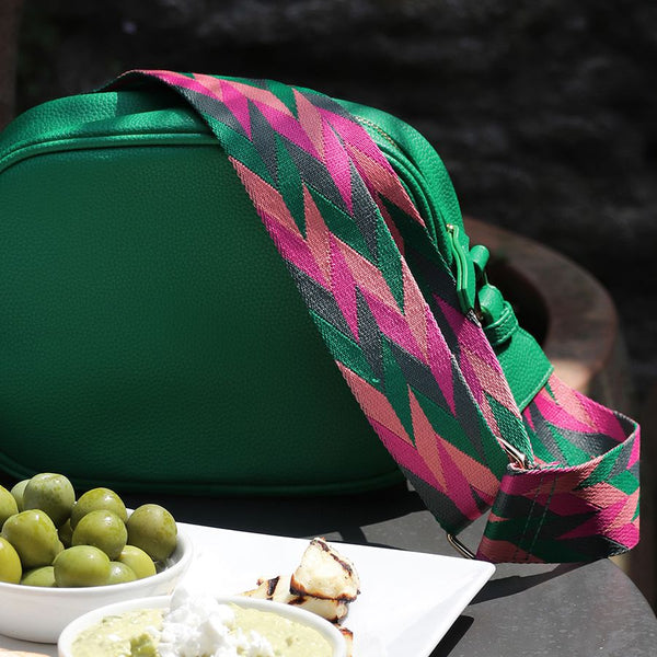 BRIGHT GREEN VEGAN LEATHER CAMERA BAG WITH BRIGHT PINK/GREEN MIX GEO STRAP