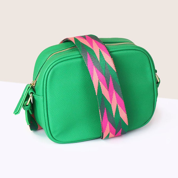 BRIGHT GREEN VEGAN LEATHER CAMERA BAG WITH BRIGHT PINK/GREEN MIX GEO STRAP
