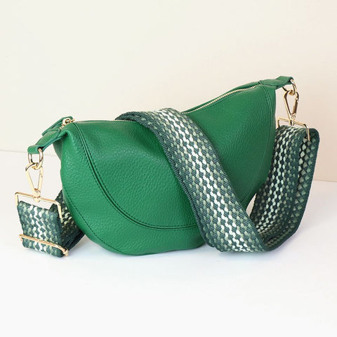 EMERALD GREEN VEGAN LEATHER HALF MOON BAG WITH WOVEN SPOTTED STRAP