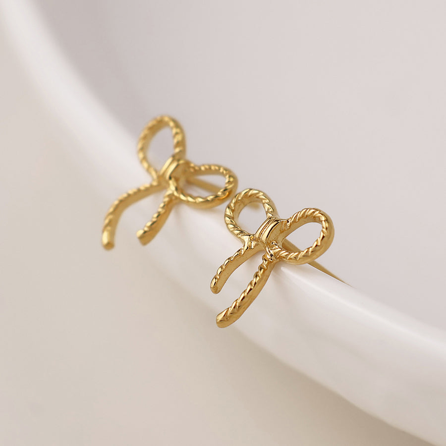 Sterling Silver With Gold Plating Twist Bow Stud Earrings